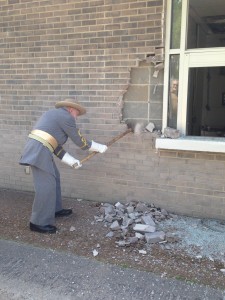 Kenneth Bohannon, 73, swings sledgehammer at Dominos. Bohannon often plays Robert E. Lee during Civil War Re-enactments