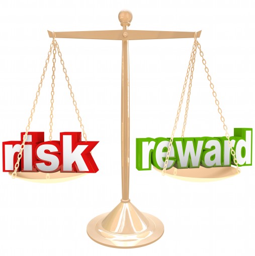 Risk Vs Reward Words on Scale Weigh Positives and Negatives investment risks