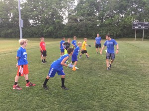 The Blaze coaches work with participants on fundamentals and technique.