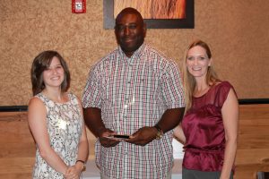 Maurice receiving award, from left, Alex Windings (Coalition Coordinator), Maurice Box and Kristi Sylvester (Coalition Chair)