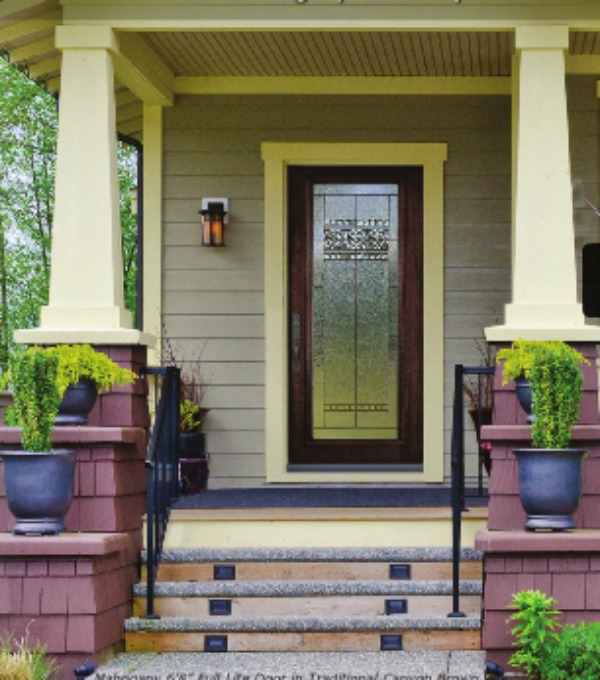 A simple bungalow is suddenly bursting with charm with a door that gives character to the home. Door from Classic Doors, 319 Hermitage Avenue, Nashville, 615-256-7278 