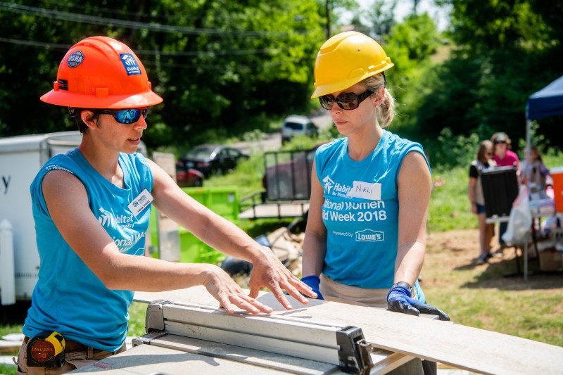 Heather Photo_Tasha_teaching_Nikki Habitat for Humanity