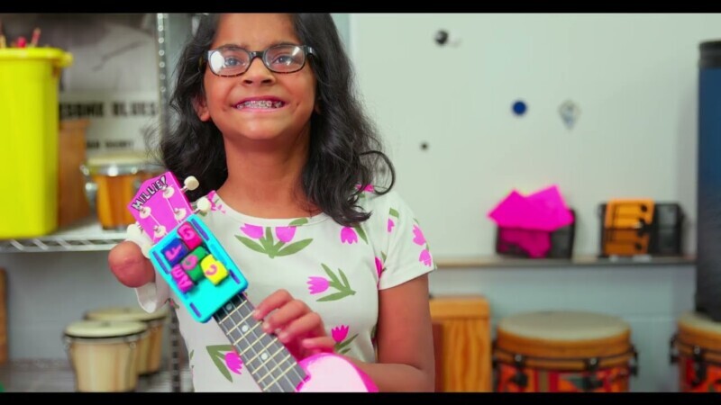 Oak View Teacher Creates Device to Help Student Play the Ukulele