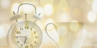 ‘Spring Forward’ This Sunday: Daylight Saving Time Begins clock stock photo